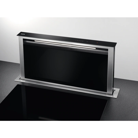 Hota incorporabila de blat AEG DDE5960B, Absorbtie 700 mc/h (intensiv), 1 motor, 3 viteze+intensiv, 2 filtre de aluminiu lavabile, Filtru de carbon Long Life, Control touch, Functie Breeze, 90 cm, Negru